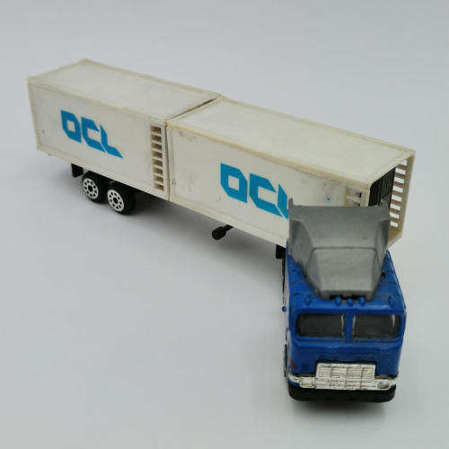 Models K7 International 9800 toy truck with OCL trailer was listed
